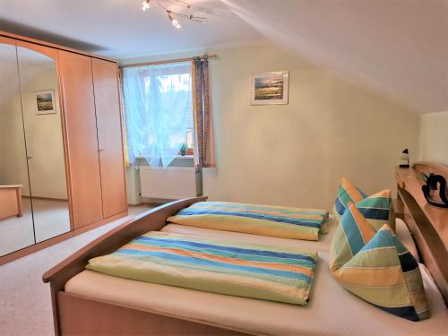 Postel nebo postele na pokoji v ubytování Ferienwohnung Träxler
