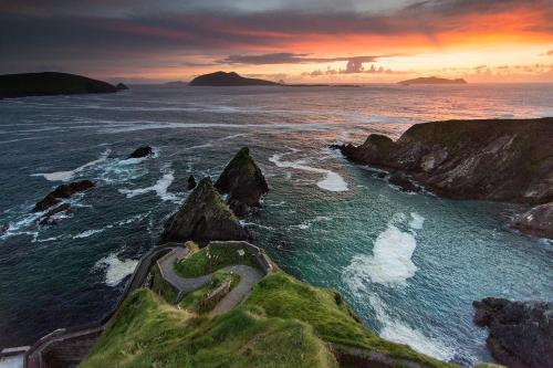 a view of the ocean with rocks in the water at Cill Bhreac House B&B in Dingle