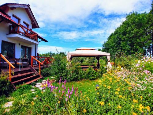 Κήπος έξω από το Rest in Manowo - Holiday Home Baltic Sea