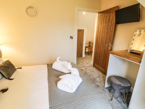 Voodi või voodid majutusasutuse Globe Cottage toas