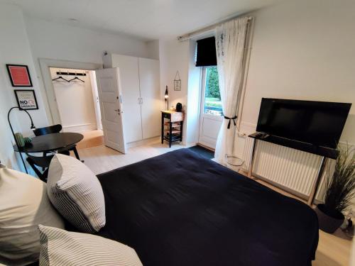 Afbeelding uit fotogalerij van Provstegården Bed & Breakfast in Hovedgård