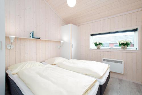 Postel nebo postele na pokoji v ubytování Resort 2 Beach House B 50