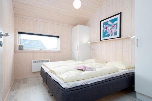 Ένα ή περισσότερα κρεβάτια σε δωμάτιο στο Resort 2 Sea Lodge C 65