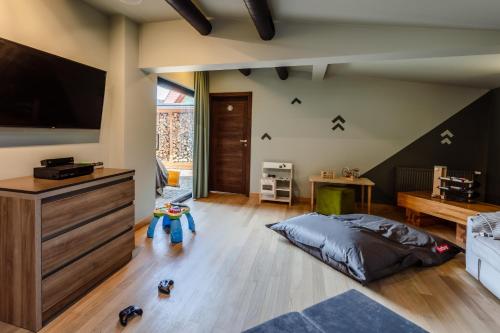 TV a/nebo společenská místnost v ubytování Villa Cam In Ski