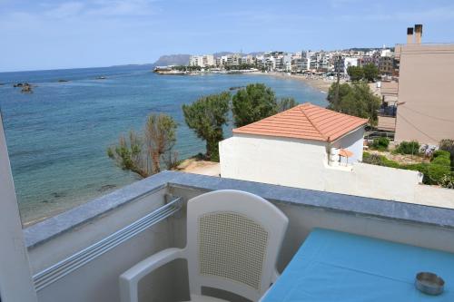 a balcony with a view of the ocean at Klinakis Beach Hotel in Chania Town