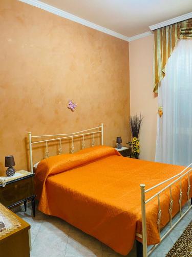 A bed or beds in a room at Giusy's House
