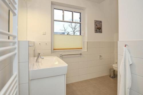 Phòng tắm tại Reethaus Am Mariannenweg 06a