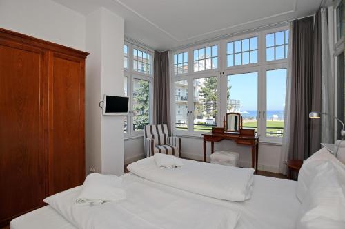 Cama ou camas em um quarto em Villa Rheingold - Wellgunde Wohnung 1b
