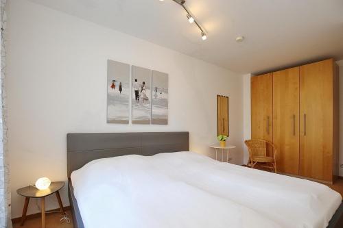 Postel nebo postele na pokoji v ubytování Achtern Diek Wohnung 13