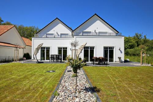 Zahrada ubytování Haus am Wald Wohnung Strand