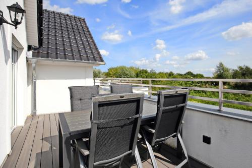 Balkón nebo terasa v ubytování Haus am Wald Wohnung Strand