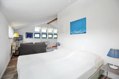 Postel nebo postele na pokoji v ubytování Apartmenthaus Bull Wohnung 6