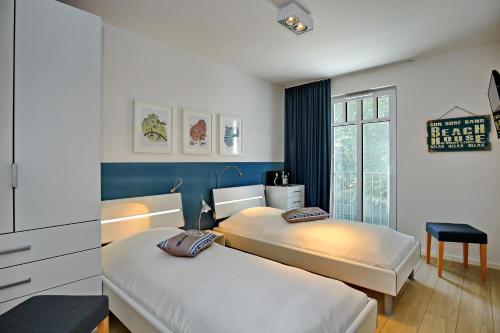 A bed or beds in a room at Linden-Palais Wohnung 29