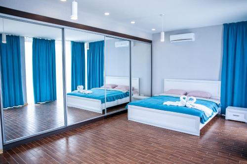Кровать или кровати в номере Villa Blanca