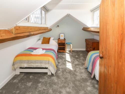 Posteľ alebo postele v izbe v ubytovaní 3 Cae'r llwyn Cottages