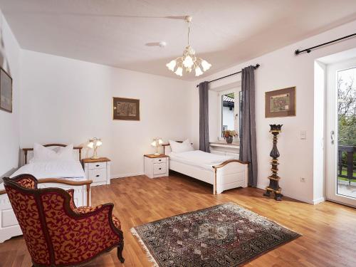 Postel nebo postele na pokoji v ubytování Villa Sawallisch