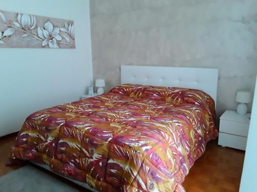 B&B LA ROSA GIALLAにあるベッド