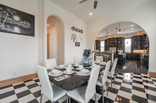 a dining room with a table and chairs at The Starlight Tower Manor, River, Arcades, Observatory, Theater in Fort Atkinson