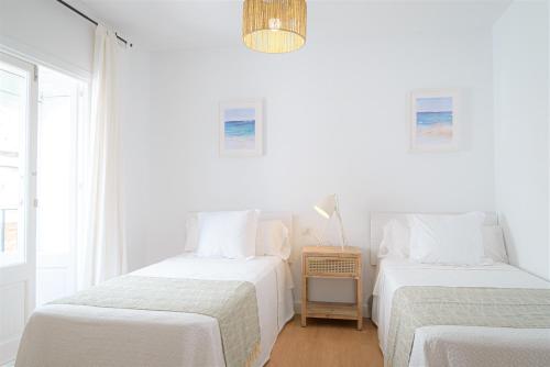 Hostal La Calzadaにあるベッド