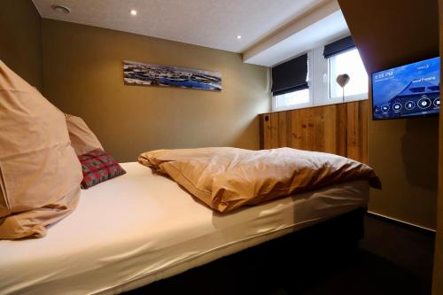 Postel nebo postele na pokoji v ubytování Chalet 24