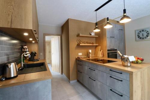 Kuchyň nebo kuchyňský kout v ubytování Chalet 24
