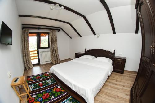 Säng eller sängar i ett rum på La Ograda