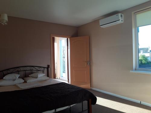 Katil atau katil-katil dalam bilik di Hotel Jonik Land