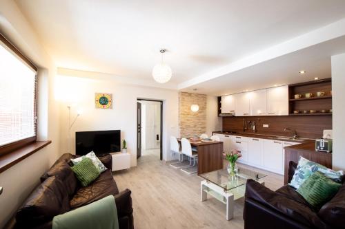 Kuchyň nebo kuchyňský kout v ubytování Apartman MANDALA