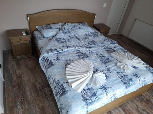 Postel nebo postele na pokoji v ubytování Guest house-restaurant St. George / Къща за гости-ресторант Свети Георги