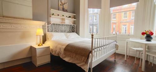 Krevet ili kreveti u jedinici u okviru objekta Gloucester Garden in South Kensington