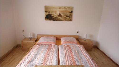 A bed or beds in a room at Ferienwohnung Spreewald Betty