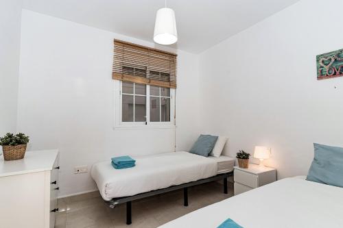 Posteľ alebo postele v izbe v ubytovaní Andaluz Apartments - Mirador