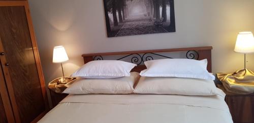 Katil atau katil-katil dalam bilik di Rooms & Apartment STELIO