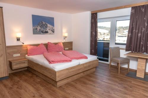 Postel nebo postele na pokoji v ubytování Pension Thainerhof