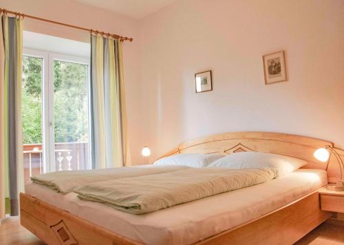 Haus Waldfriede tesisinde bir odada yatak veya yataklar