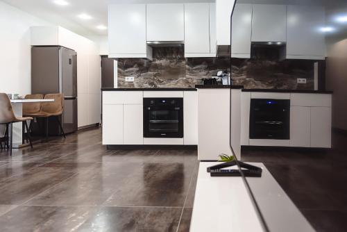 Кухня или кухненски бокс в Concept Apartments Budiului 42