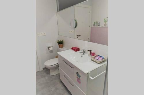 Ванна кімната в KIKU Apartments