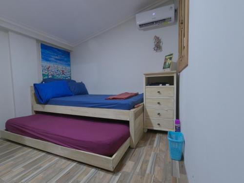 Katil atau katil-katil dalam bilik di Ngomah Tentrem