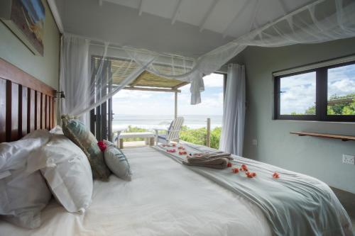 Cama o camas de una habitación en Baleia Azul 11