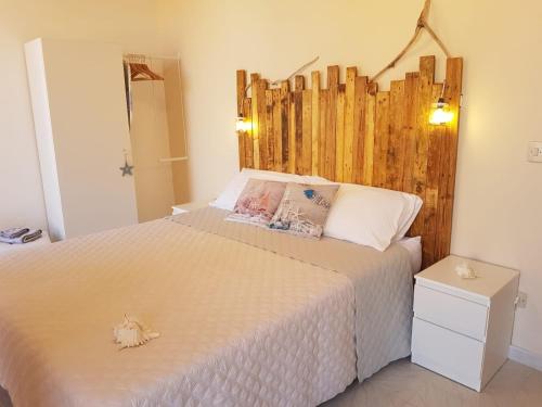 A bed or beds in a room at BALCONI SU TROPEA
