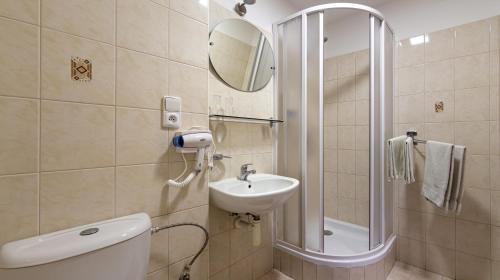 Koupelna v ubytování Hotel Alfa