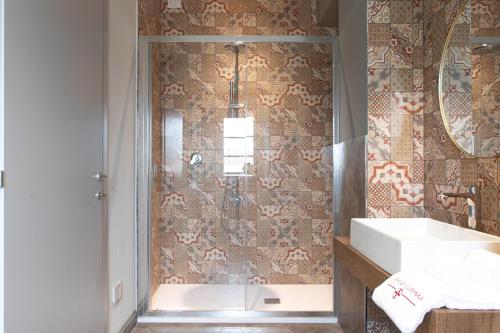 Koupelna v ubytování Monna Caterina Wine Resort