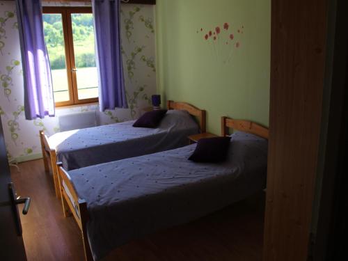 Ліжко або ліжка в номері Gîte Halles-sous-les-Côtes, 4 pièces, 6 personnes - FR-1-585-5