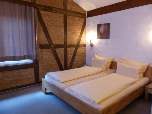 Cama o camas de una habitación en Altstadt-Hotel Gelnhausen