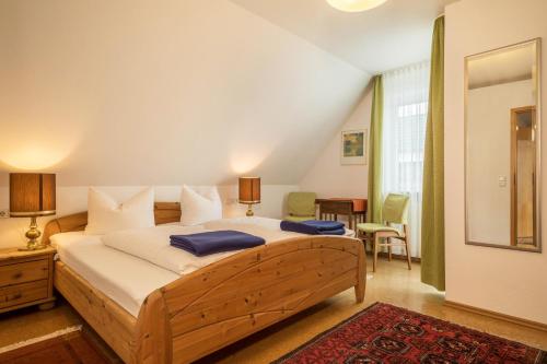 Ένα ή περισσότερα κρεβάτια σε δωμάτιο στο Ferienwohnung Haidle