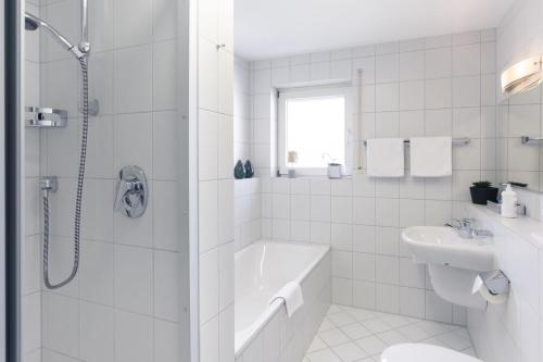 A bathroom at Kurviertel Wohnung IV