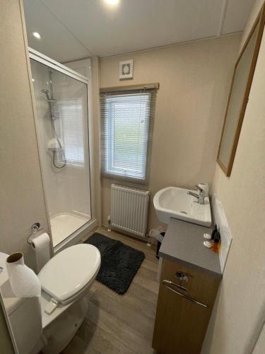 Kúpeľňa v ubytovaní Boggy Creek - lodge with hot tub