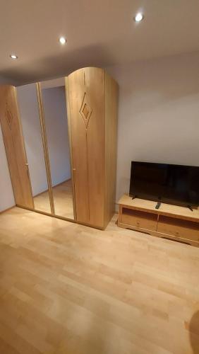 Adlerblickにあるテレビまたはエンターテインメントセンター