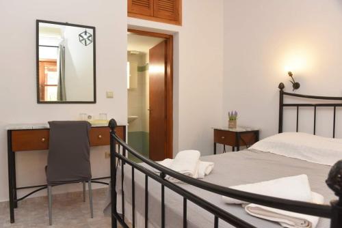 A bed or beds in a room at Laxesis