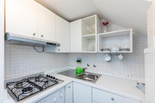 Cucina o angolo cottura di Le Casasse "Vico Mendaro 10"
